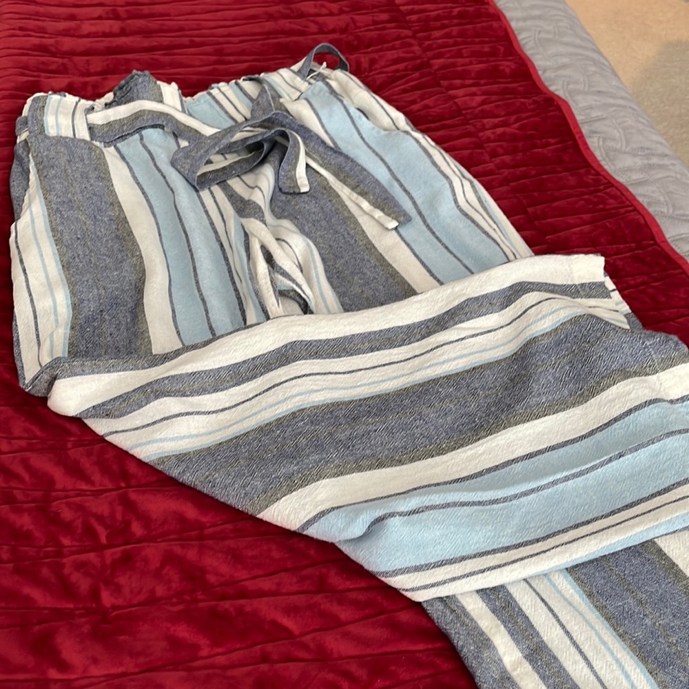 Bohemian light woven fabric, blues, and cream side pockets elastic waist , pant